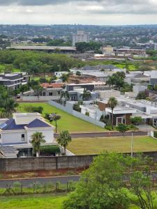 an aerial view of houses in a city at Apartamento Inteiro Foz do Iguaçu Prox Rodoviaria in Foz do Iguaçu