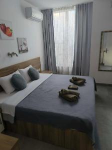 Giường trong phòng chung tại Tea Sliema Cozy House +32 ảnh