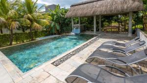 La alberca dentro o cerca de Seven Cocos House