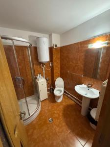 Et badeværelse på Apartament 10