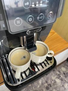 Příslušenství pro přípravu čaje a kávy v ubytování 旅館おぎた + 12 fotografií