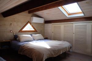 Postel nebo postele na pokoji v ubytování Duplex proche du port