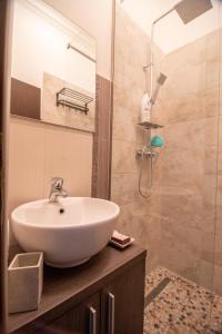 Et badeværelse på Lazar Central Apartment - Familii și Grupuri