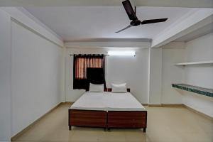 Postel nebo postele na pokoji v ubytování Hotel O Tulip Gold + 23 fotografií