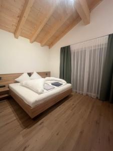 Postel nebo postele na pokoji v ubytování Haus am Rua