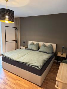 Ένα ή περισσότερα κρεβάτια σε δωμάτιο στο Helles Garten-Apartment in Graz