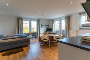 TV a/nebo společenská místnost v ubytování Villa am Wall