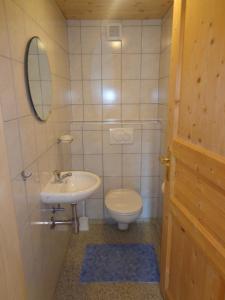 Ванная комната в Ferienhütte Georg