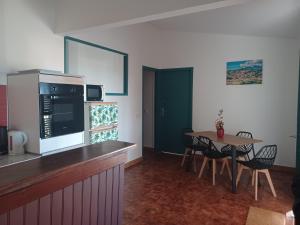 Kuchyň nebo kuchyňský kout v ubytování SUCRIER's PARADISE