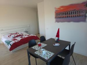 Giường trong phòng chung tại Relais la Terrazza +16 ảnh