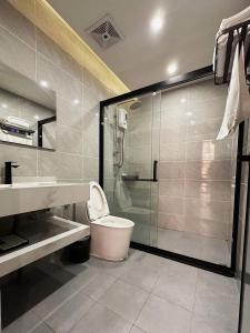 Koupelna v ubytování 游子酒店