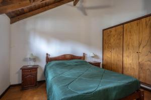 En eller flere senge i et værelse på Pinamar De La Lisa + 30 billeder