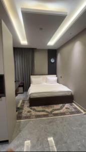 a bedroom with a bed in a room at Cassava street in Abuja