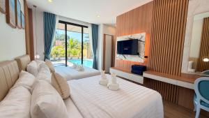 TV/trung tâm giải trí tại Villa Nadsuree Ao-Nang Modern House