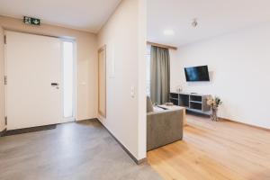 TV a/nebo společenská místnost v ubytování Dorfvilla Niedernsill