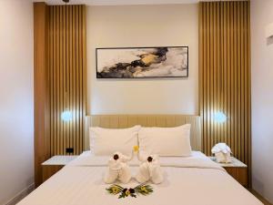 Giường trong phòng chung tại Villa Nadsuree Ao-Nang Modern House +82 ảnh