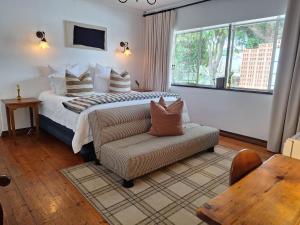 Postel nebo postele na pokoji v ubytování 3@Marion Guest House