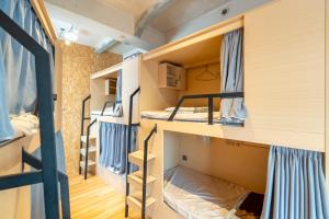 Кровать или кровати в номере みどり荘 midorisou