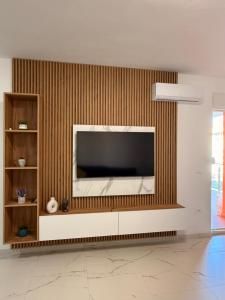 Et tv og/eller underholdning på Kron apartment