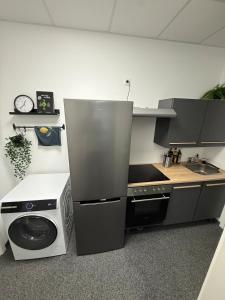 Køkken eller tekøkken på Schwabentor-Apartment