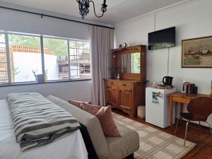 Kuchyň nebo kuchyňský kout v ubytování 3@Marion Guest House