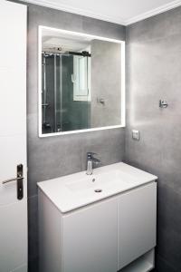 Et badeværelse på Naiada Apartments