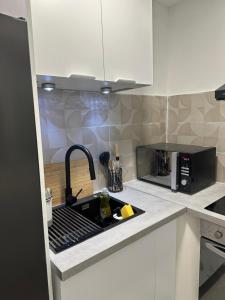 Nhà bếp/bếp nhỏ tại Appartement entier en cœur de ville