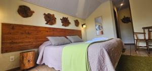 Giường trong phòng chung tại Pousada Atalaia