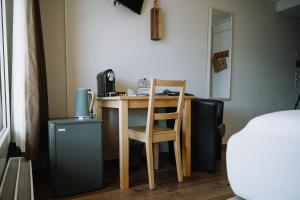 Kuchyň nebo kuchyňský kout v ubytování Alpenblick Weggis - Panorama & Alpen Chic Hotel