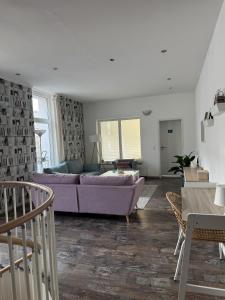 Posezení v ubytování Themenzimmer Pusteblume Nähe Hauptbahnhof