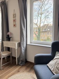 Posezení v ubytování Themenzimmer Pusteblume Nähe Hauptbahnhof