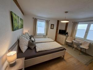 Un televizor și/sau centru de divertisment la Come In