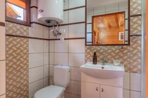 Koupelna v ubytování Kakadu domki letniskowe Niechorze + 10 fotografií