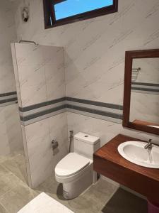 Ванная комната в Udee Guesthouse Pakse