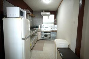 Køkken eller tekøkken på Base 高志保