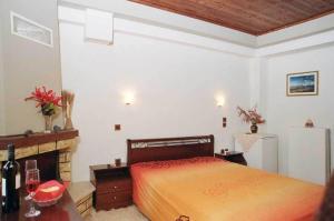 Postel nebo postele na pokoji v ubytování Guesthouse Irida