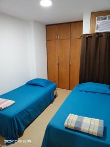 En eller flere senge i et værelse på Comfortable and Excellent Location