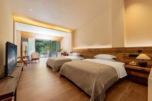 TV/trung tâm giải trí tại Jade Peak Hot Spring Villa