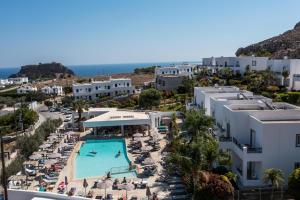 an aerial view of a resort with a swimming pool at 'Lindian Myth' Sea View Studios in Líndos