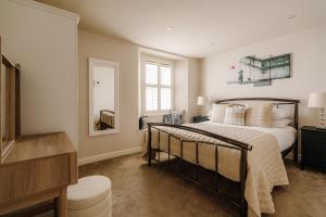 En eller flere senge i et værelse på Gable End, Luxury Apartment, Central Ambleside