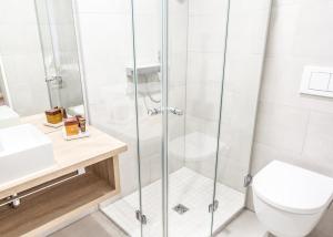 Koupelna v ubytování Burghotel Lingen + 21 fotografií