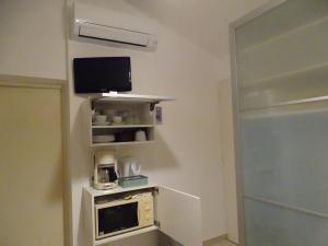 Η κουζίνα ή μικρή κουζίνα στο Chambre indépendante