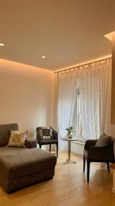 Et opholdsområde på Respiro - deluxe apartment - super central - only real beds - wifi airco TV65