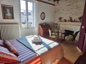 En eller flere senge i et værelse på La Maison des Corporations