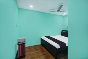 Rúm í herbergi á Super Hotel O Grill Inn