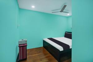 Rúm í herbergi á Super Hotel O Grill Inn