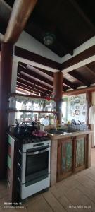 Kuchyň nebo kuchyňský kout v ubytování Rancho São Francisco de Assis - 2 suítes