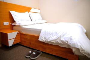 Ένα ή περισσότερα κρεβάτια σε δωμάτιο στο The Min Capri Haven Studio