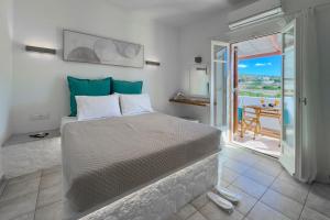 Postel nebo postele na pokoji v ubytování NAMASTEmilos