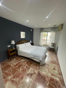 En eller flere senge i et værelse på Piso muy amplio Casco Historico